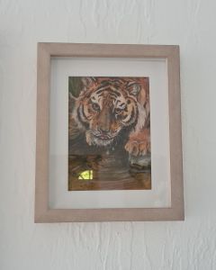 Pastel op papier van een Sumatra tijger
